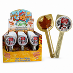A retail display box of maple syrup lollipops alongside two individual lollipops: one shaped like a maple leaf and one with a gold spoon handle, both on a white background.
