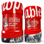 Two red plush blankets with white text on a white background