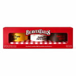 BeaverTails scented candles gift set in a red box with a clear window, showing three candles in yellow, white, and dark brown containers.